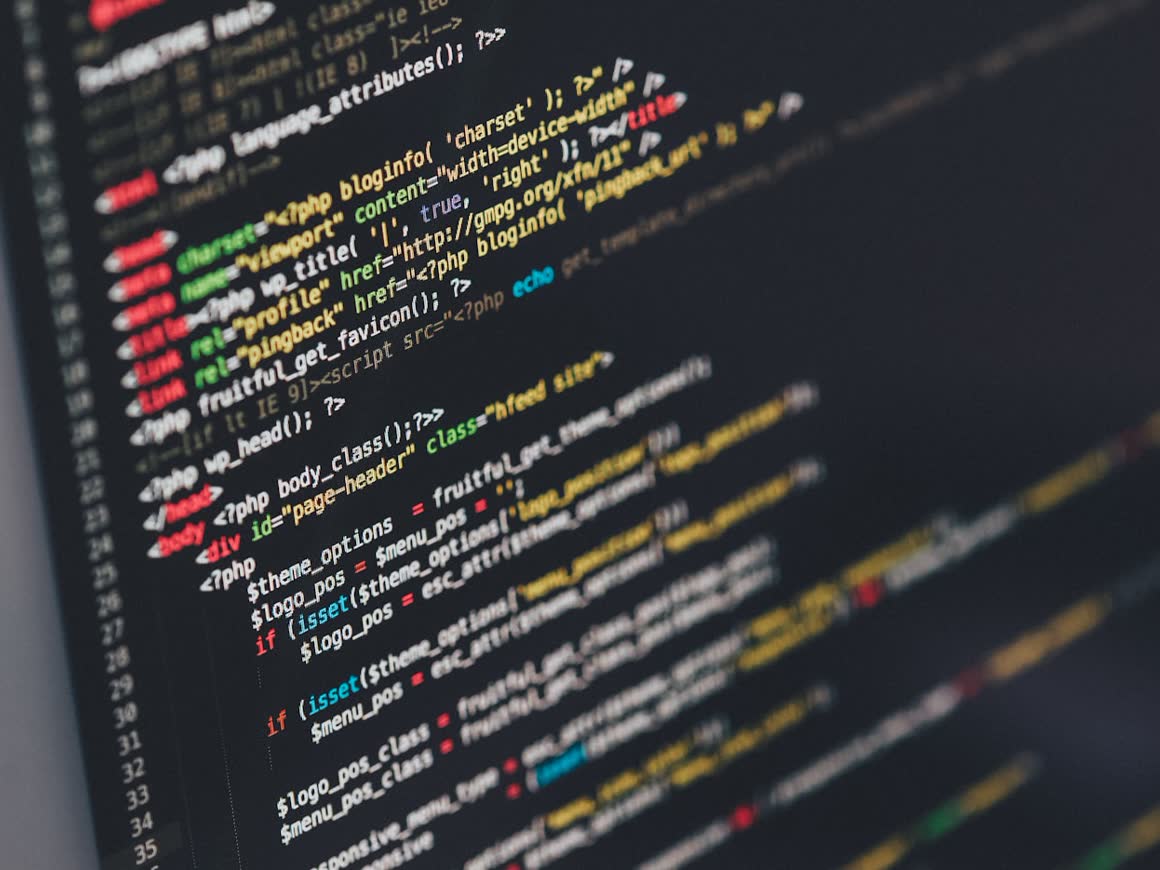 Application source code on a dark editor screen